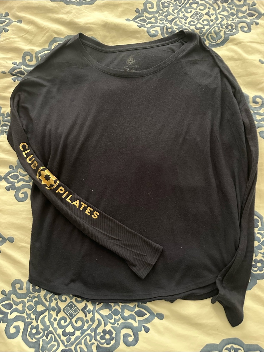 Club Pilates Black Long Sleeve Tee with Gold Sleeve Logo